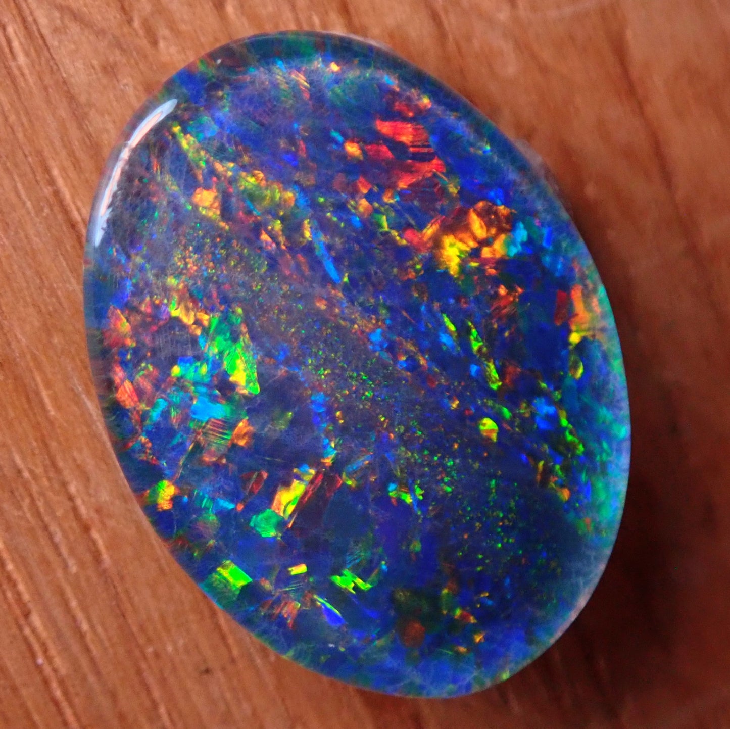AAA + Black Opal Triplet, Australien, 6,67ct - 1,334g - 17,96x 13,08x 3,78mm