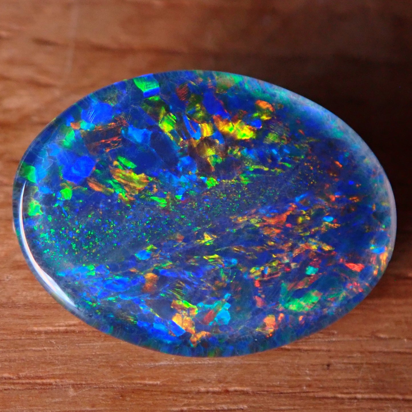 AAA + Black Opal Triplet, Australien, 6,67ct - 1,334g - 17,96x 13,08x 3,78mm