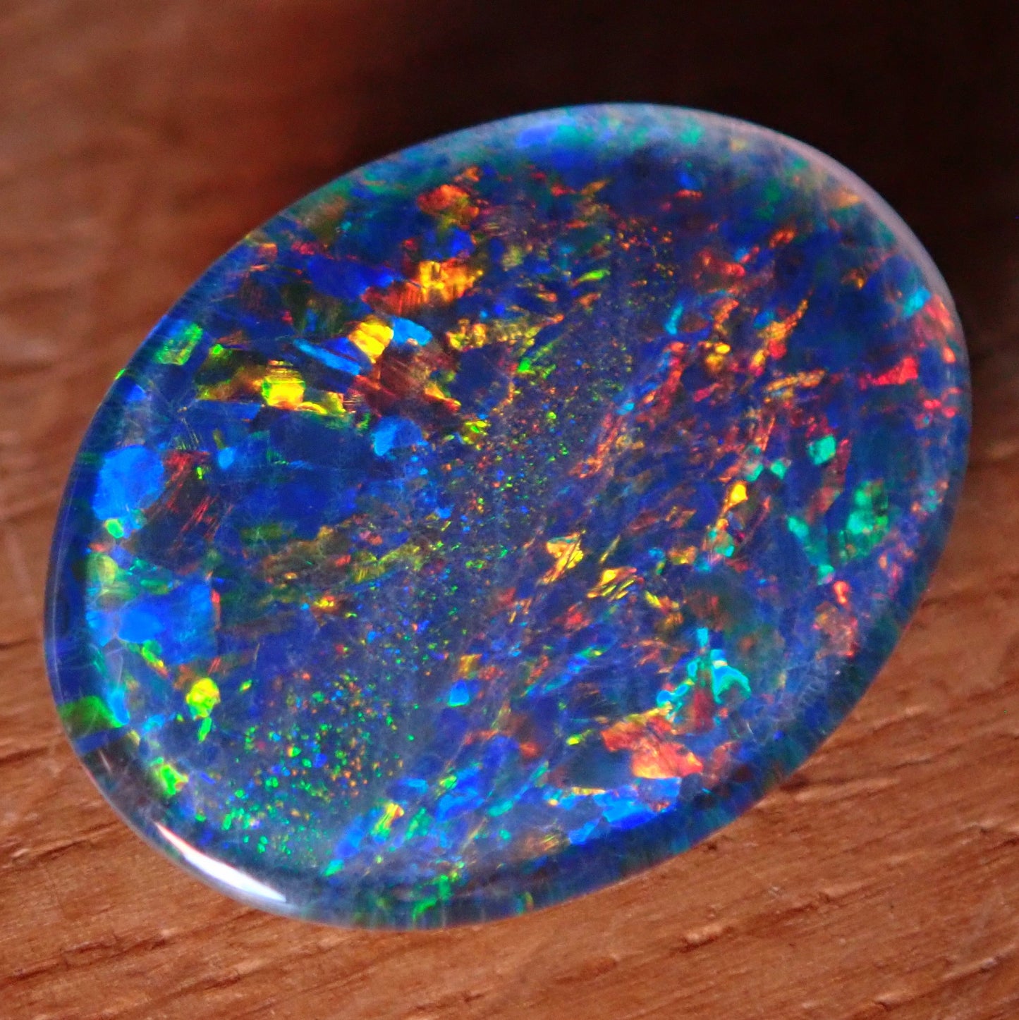 AAA + Black Opal Triplet, Australien, 6,67ct - 1,334g - 17,96x 13,08x 3,78mm