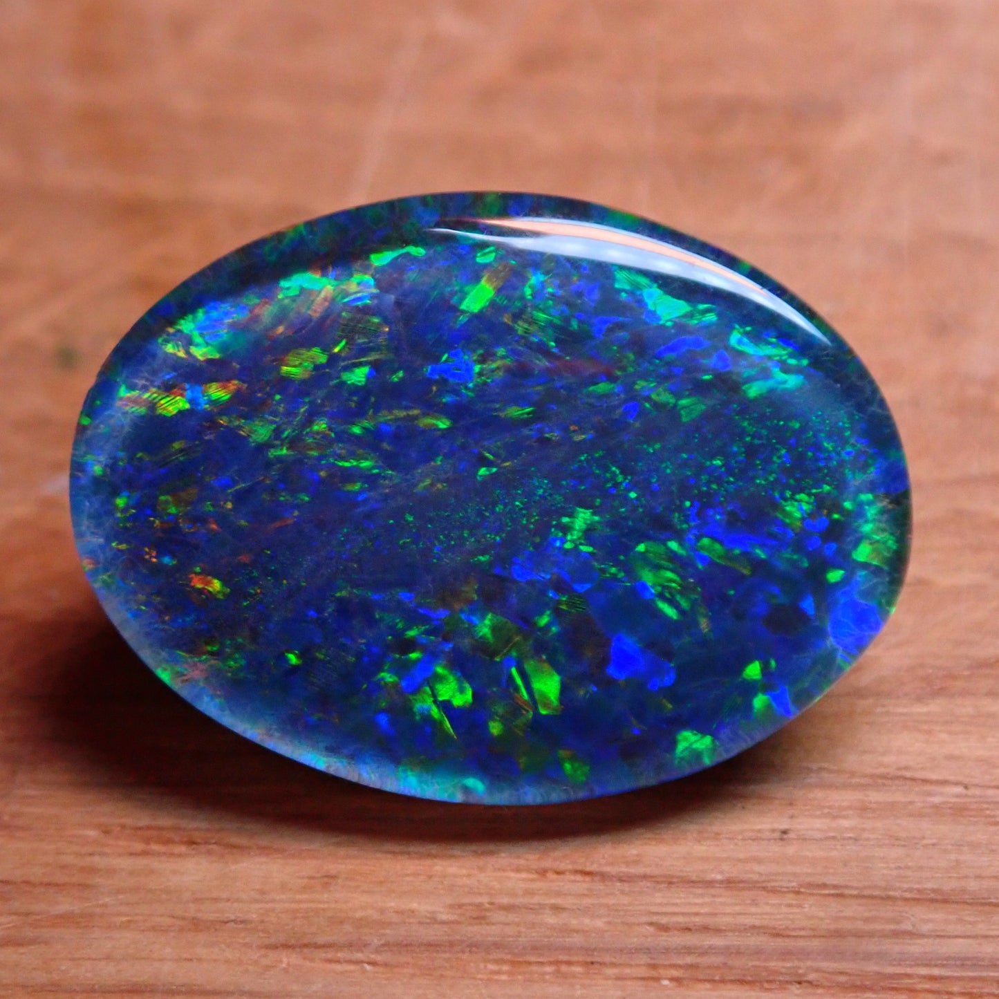 AAA + Black Opal Triplet, Australien, 6,67ct - 1,334g - 17,96x 13,08x 3,78mm