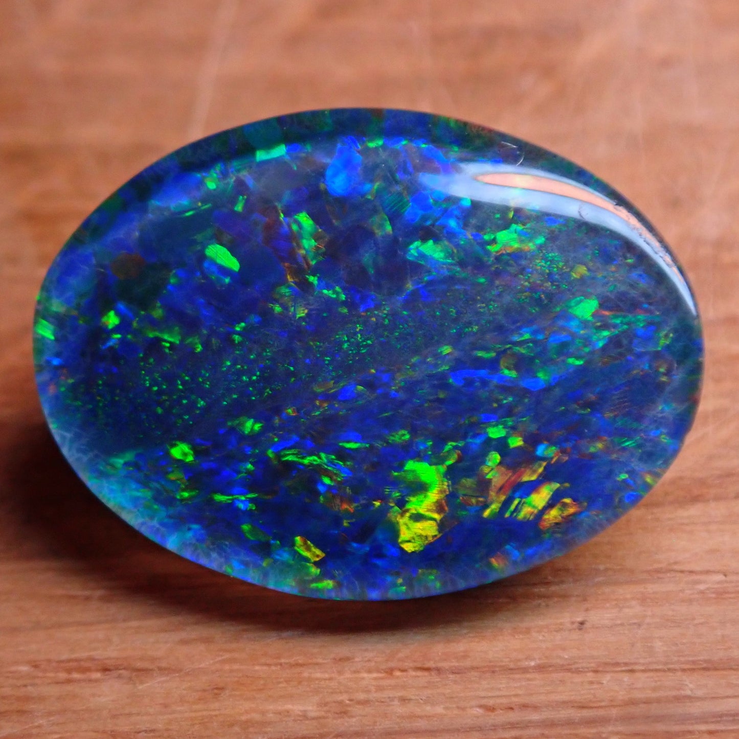 AAA + Black Opal Triplet, Australien, 6,67ct - 1,334g - 17,96x 13,08x 3,78mm