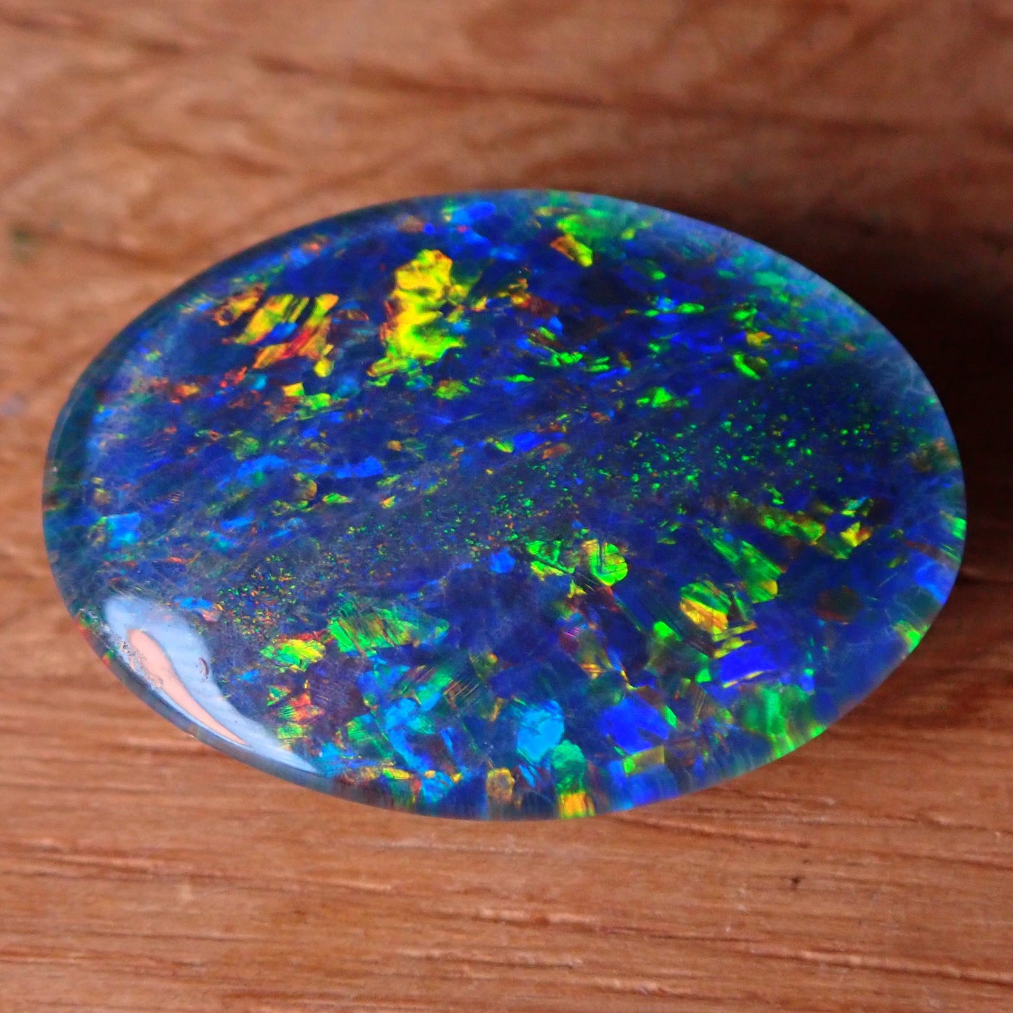 AAA + Black Opal Triplet, Australien, 6,67ct - 1,334g - 17,96x 13,08x 3,78mm