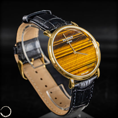 Tigeraugen-Uhr mit Schweizer Uhrwerk -46,80g 127,75ct
