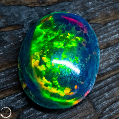 Großer Schwarzer Opal Cabochon -  0,32g -1,6Ct