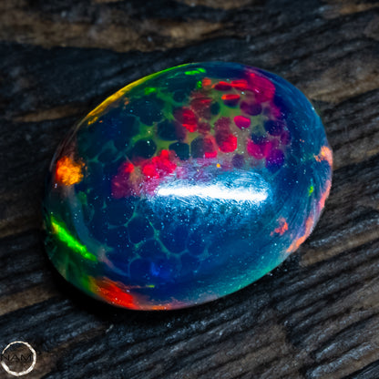 Großer Schwarzer Opal Cabochon -  0,32g -1,6Ct