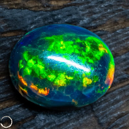 Großer Schwarzer Opal Cabochon -  0,32g -1,6Ct