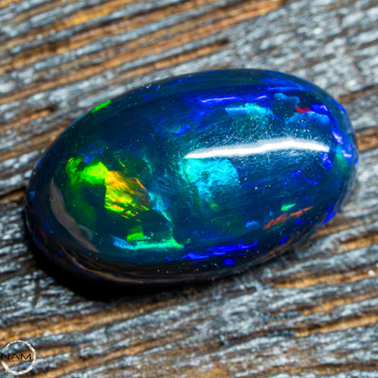 Großer AAA+ Schwarzer Opal Cabochon - 0,58g/2,9ct