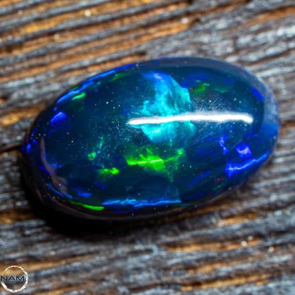 Großer AAA+ Schwarzer Opal Cabochon - 0,58g/2,9ct