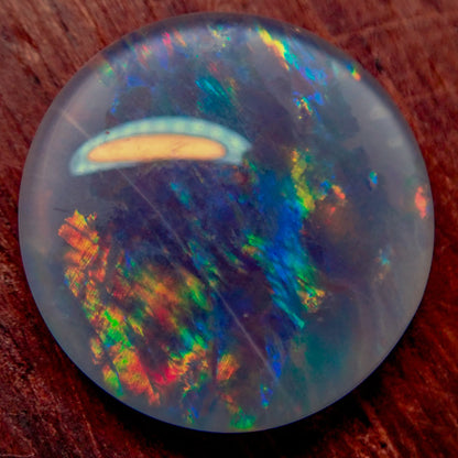 AAA + Black Opal Triplet, Australien, 0,681g - 3.405ct