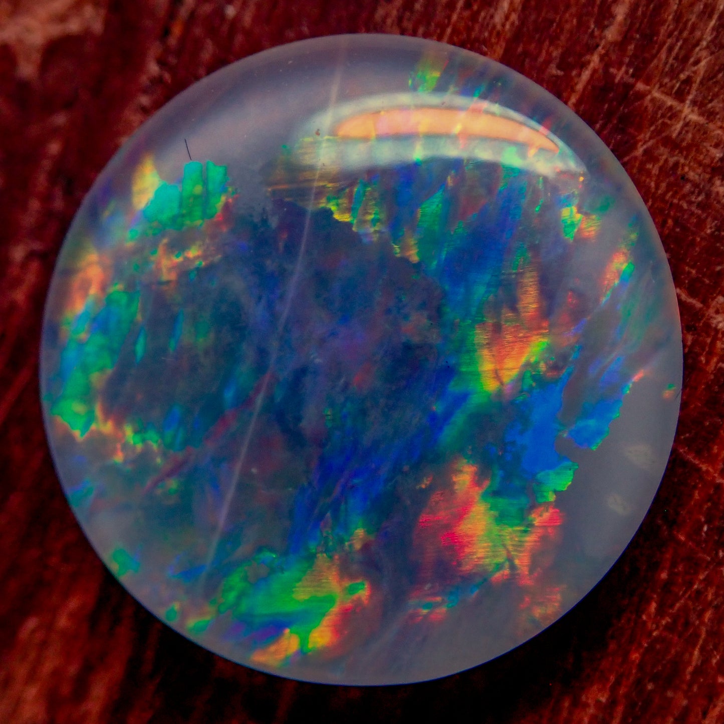 AAA + Black Opal Triplet, Australien, 0,681g - 3.405ct