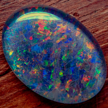 AAA + Black Opal Triplet, Australien, 0,724g - 3,62ct