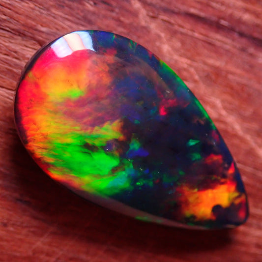 Wunderschöner Opal Cabochon (Schwarz) aus Äthiopien, 8.905 ct - 1,781g- 25,09 x 13,67 x 5,71mm