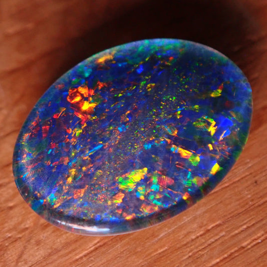 AAA + Black Opal Triplet, Australien, 6,67ct - 1,334g - 17,96x 13,08x 3,78mm