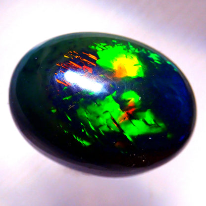 Opal Cabochon (Schwarz) aus Äthiopien, 6,17ct - 1,234g - 15,1 x 11,1 x 8,3 mm